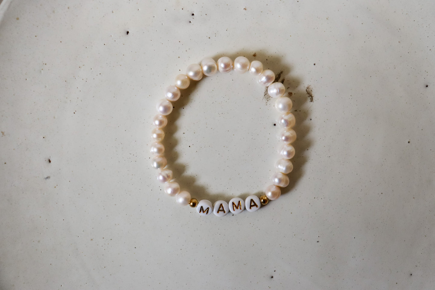 
                  
                    Pearl Letter Bracelets
                  
                