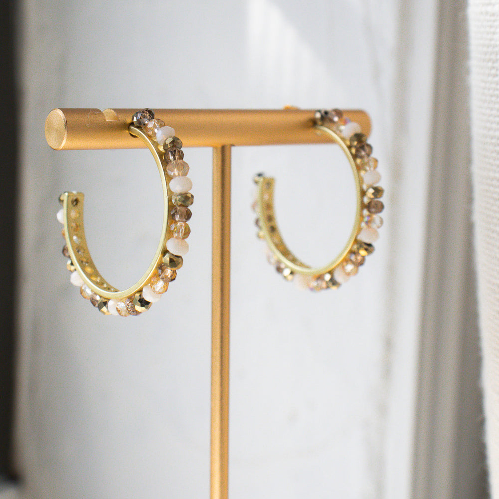 
                  
                    Crystal C Hoop Earrings
                  
                