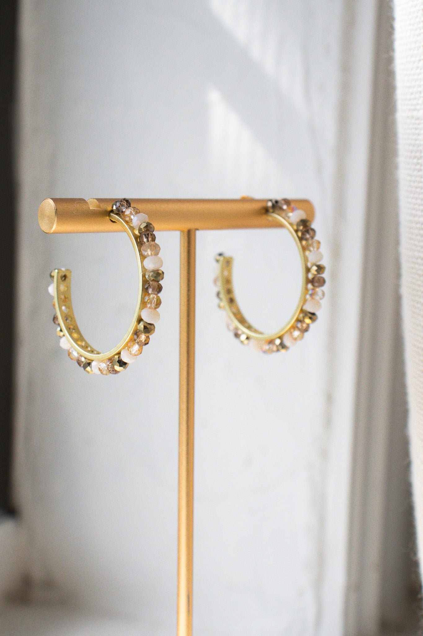 
                  
                    Crystal C Hoop Earrings
                  
                