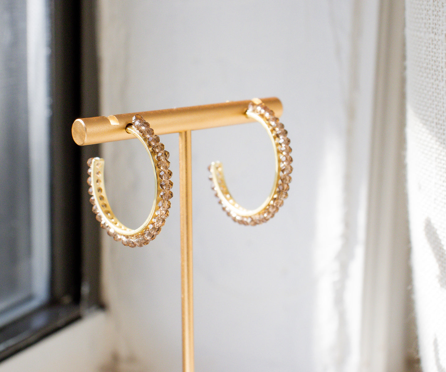 
                  
                    Crystal C Hoop Earrings
                  
                