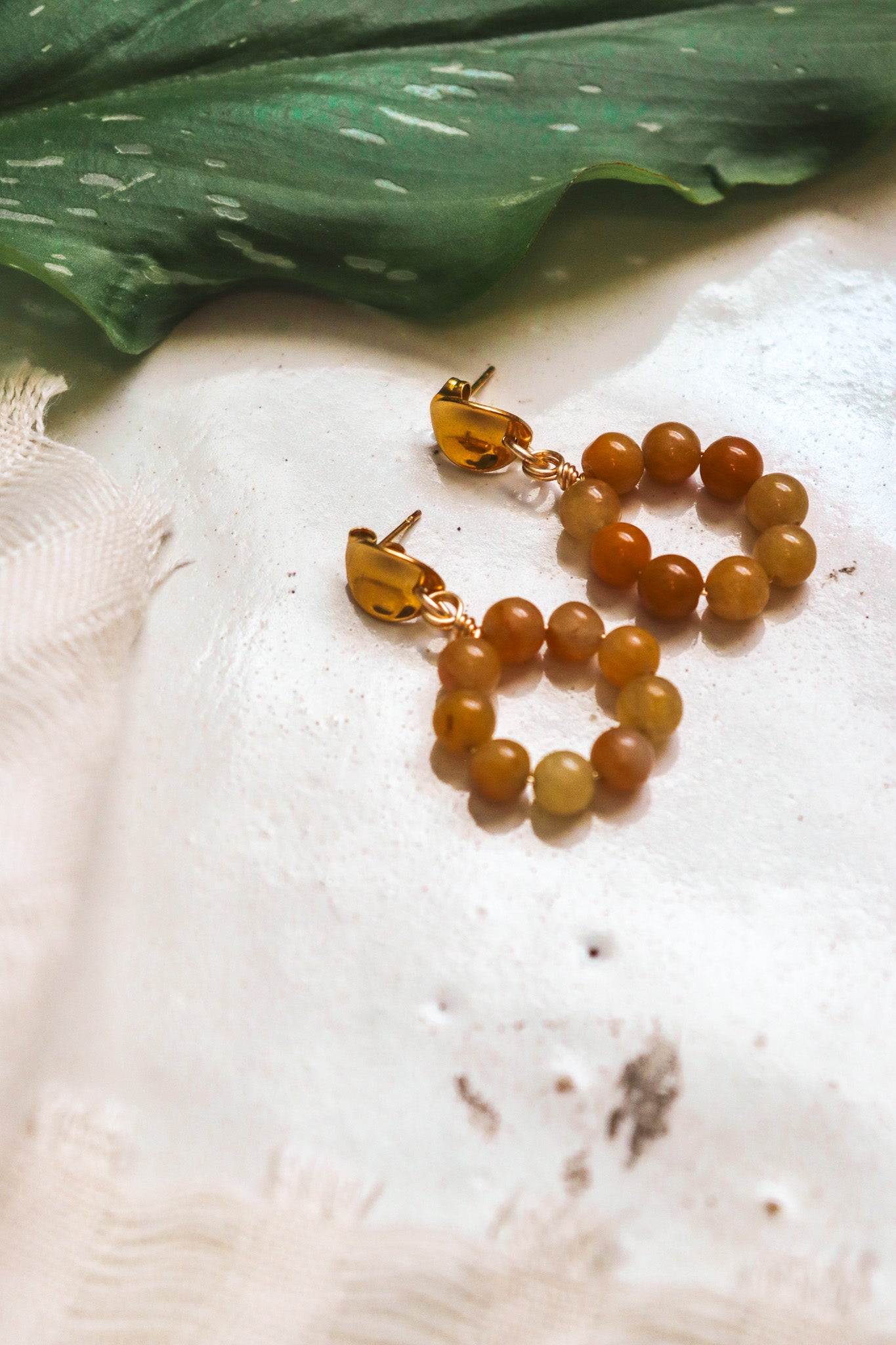 
                  
                    Natural Stone Circle Drop Earrings
                  
                