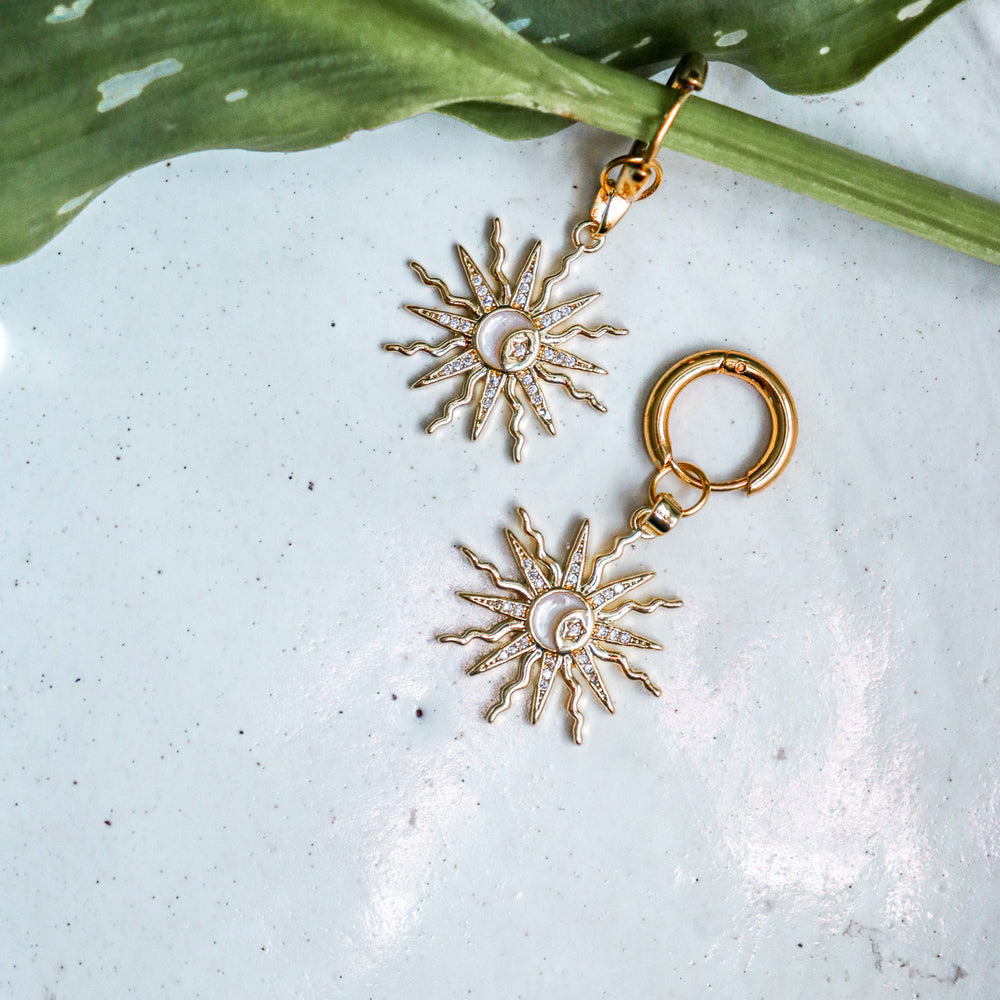 
                  
                    Sun and White Quartz Moon Huggies
                  
                