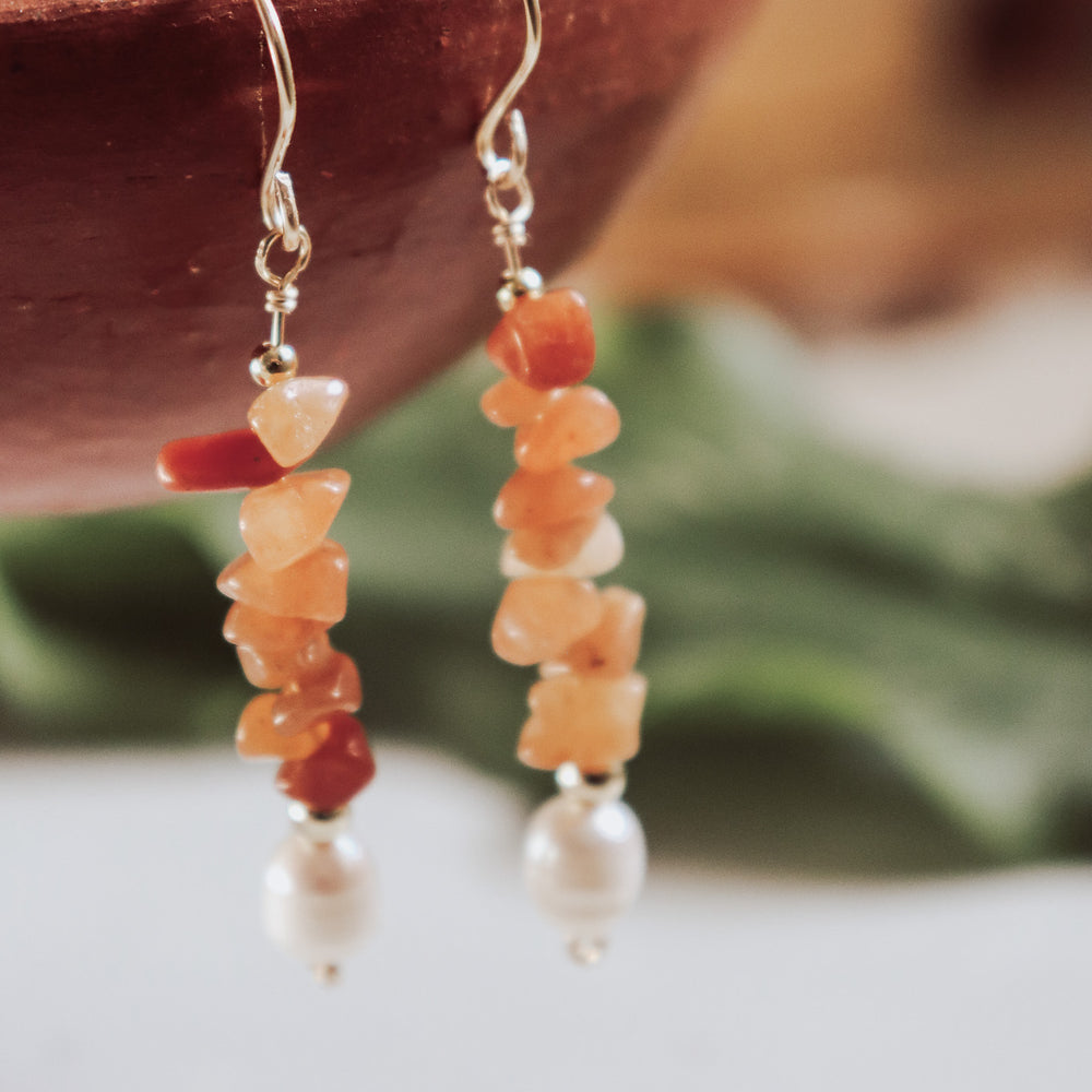 
                  
                    Crystal and Pearl Drop Earrings
                  
                