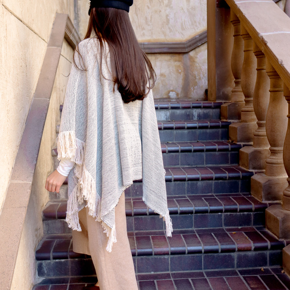 
                  
                    Textured Fringe Poncho
                  
                