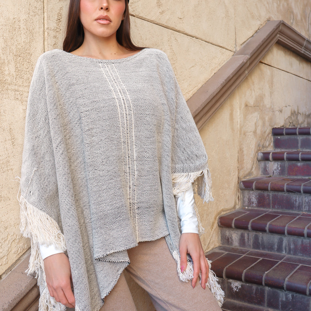 
                  
                    Textured Fringe Poncho
                  
                