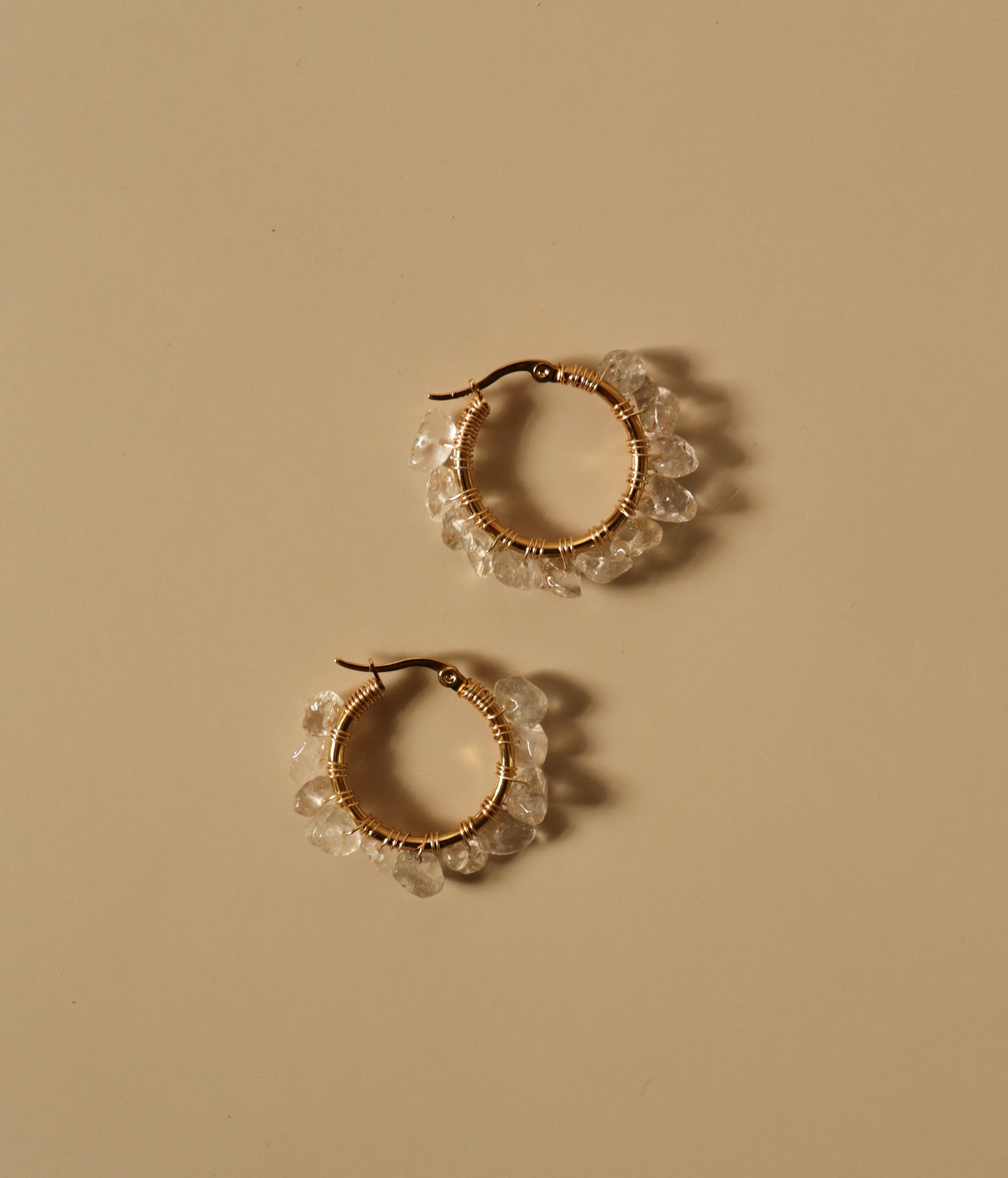 
                  
                    Clear Quartz Stone Hoop Earrings | Handmade in El Salvador by 16 Nuditos
                  
                