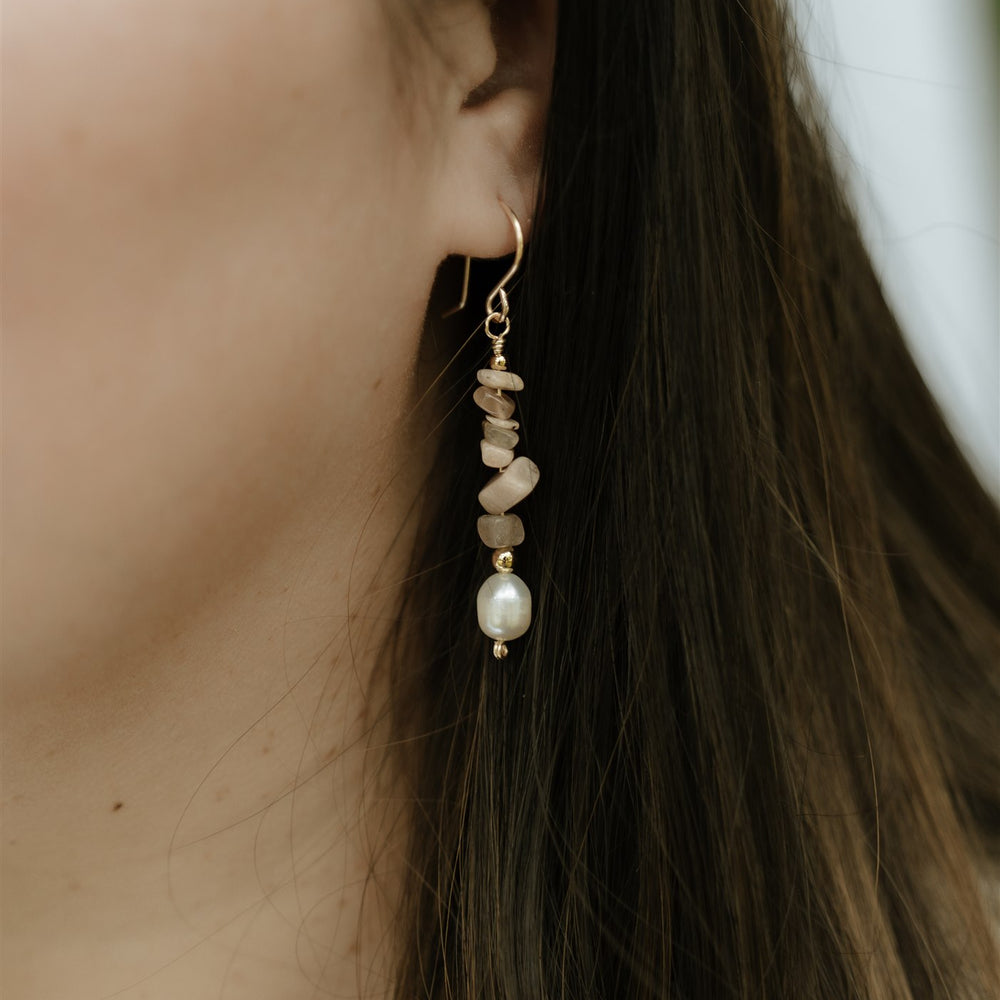 
                  
                    Crystal and Pearl Drop Earrings
                  
                