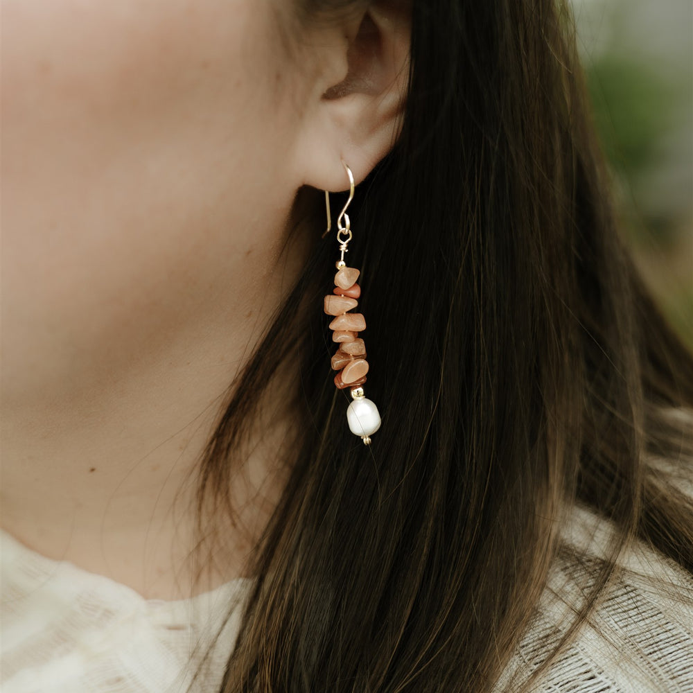 
                  
                    Crystal and Pearl Drop Earrings
                  
                